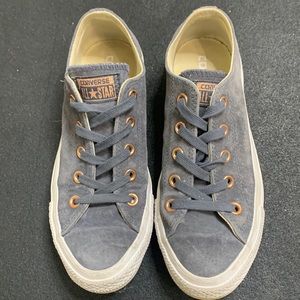 Suede sharkskin color converse with rose gold eyelets. Size US 6
